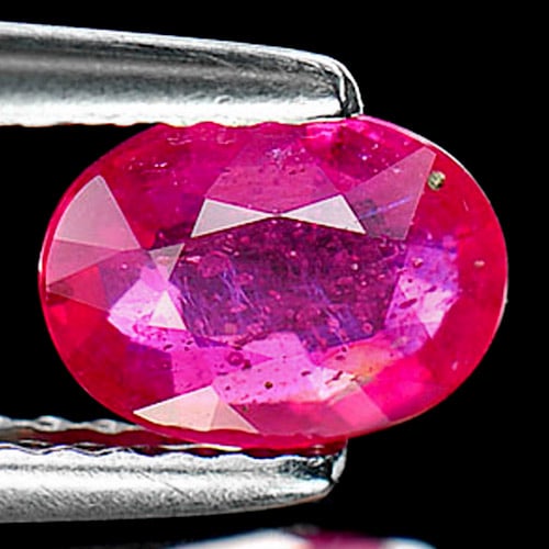 Natural Purplish Pink Ruby 1.08 Ct. Oval Shape 7 x 5 Mm Gemstone From Mozambique: Product ID: 805926531 Product Name: Natural Ruby Weight: 1.08 CT. Size: 7 x 5.2 x 3 MM. Shape: Oval Color: Purplish Pink Clarity:VSI Luster: Good Gems Origin: Mozambique Treatment: Heated (Lead-glass 