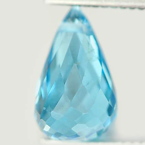 Natural Swiss Blue Topaz 2.04 Ct. Briolette with Drilled 9.1 x 5.7 Mm Gemstone From Brazil: Product ID: 807164547 Product Name: Natural Blue Topaz Weight: 2.04 CT. Size: 9.1 x 5.7 x 5.7 MM. Shape: Briolette with Drilled Color: Swiss Blue Clarity:VSI Luster: Good Gems Origin: Brazil Treatment