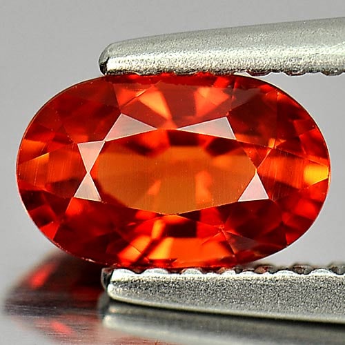 Natural Reddish Orange Sapphire 1.16 Ct. VVS Oval Shape 7.3 x 4.6 Mm. Gemstone From Tanzania (1 of 3)