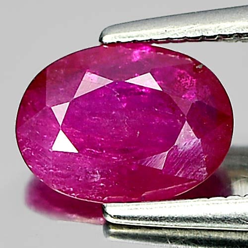 Natural Purplish Pink Ruby 1.08 Ct. Oval Shape 7.7 x 5.8 Mm. Gemstone From Thailand: Product ID: 805923479 Product Name: Natural Ruby Weight: 1.08 CT. Size: 7.7 x 5.8 x 2.5 MM. Shape: Oval Color: Purplish Pink Clarity:VSI Luster: Good Gems Origin: Thailand Treatment: Heated (Lead-glas