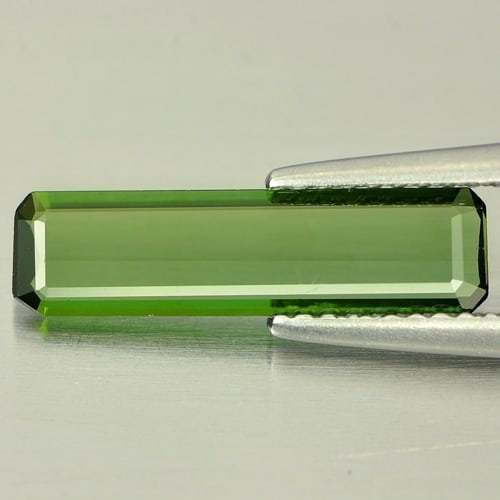 Natural Green Tourmaline 1.12 Ct. Clean Octagon Shape 16.4 x 4.4 Mm. Gemstone From Nigeria: Product ID: 807243014 Product Name: Natural Tourmaline Weight: 1.12 CT. Size: 16.4 x 4.4 x 1.6 MM. Shape: Octagon Color: Green Clarity:IF Luster: Good Gems Origin: Nigeria Treatment: Unheated Crystal 