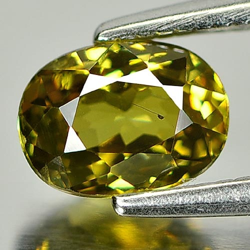Natural Demantoid Garnet 0.99 Ct. Oval Shape 6.5 x 4.8 Mm. Gemstone Unheated From Madagascar: Product ID: 802931759 Product Name: Natural Demantoid Weight: 0.99 CT. Size: 6.5 x 4.8 x 3.4 MM. Shape: Oval Color: Greenish Yellow Clarity:SI1 Luster: Very Good Gems Origin: Madagascar Treatment: Unh