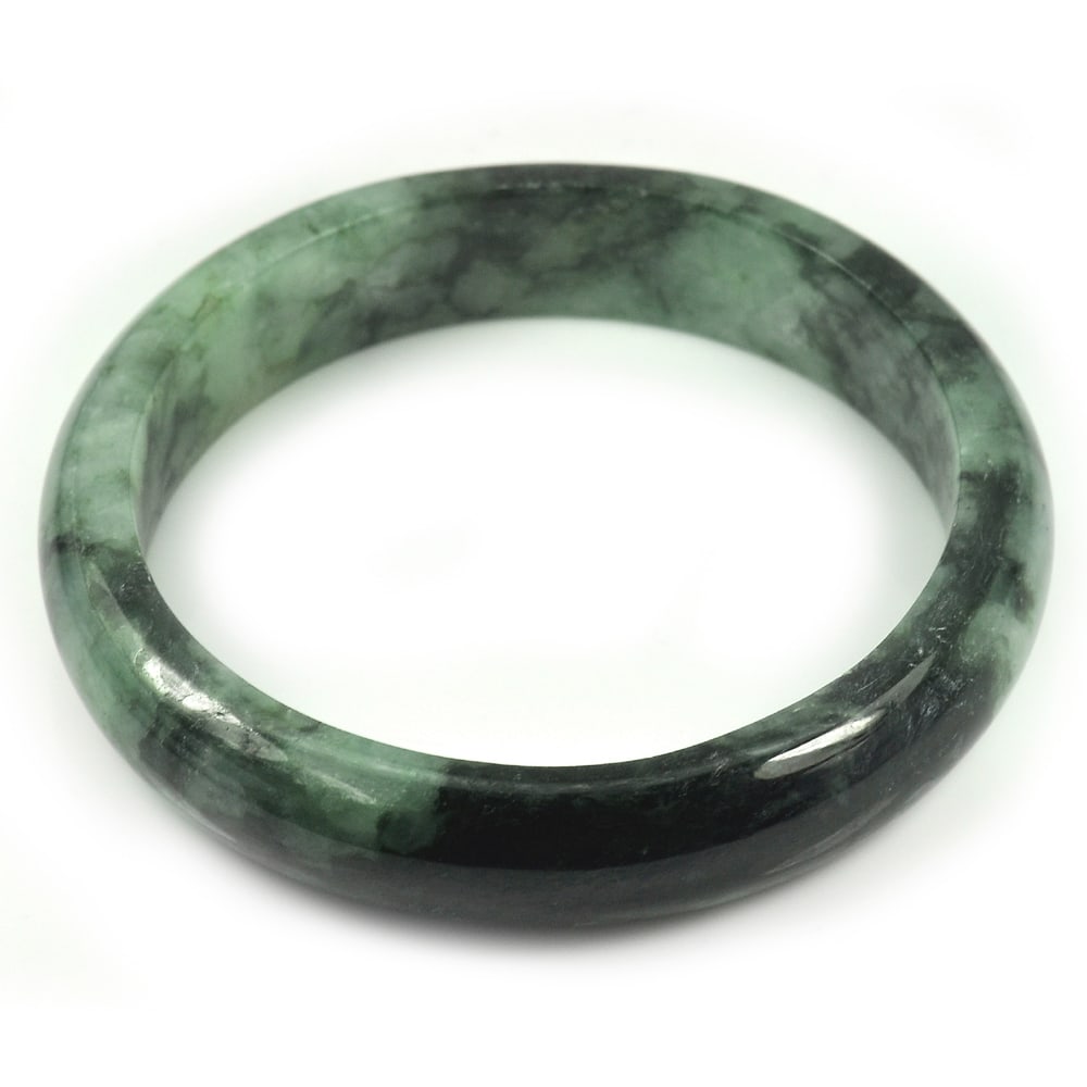 Natural Green Jade Bangle Size 80x63x14 Mm. 354.55 Ct. Unheated Gemstone: Product ID: 819815334 Product Name: Natural Jade Weight: 345.55 CT. Size: 80 x 63 x 14 MM. Shape: Round Color: Green Clarity:Opaque Luster: Good Gems Origin: Thailand Treatment: Unheated Crystal Struc