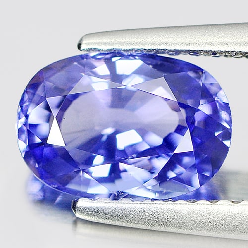 Natural Violetish Blue Tanzanite 1.47 Ct. Clean Oval Shape 8.4 x 5.9 Mm. Gemstone From Tanzania: Product ID: 807005980 Product Name: Natural Tanzanite Weight: 1.47 CT. Size: 8.4 x 5.9 x 3.9 MM. Shape: Oval Color: Blue Clarity:IF Luster: Very Good Gems Origin: Tanzania Treatment: Heated Crystal St