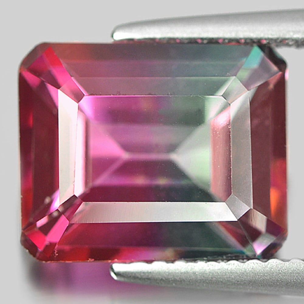 Natural Emerald Envy Pure Pink Topaz 5.62 Ct. VVS Octagon Shape 10.9 x 8.9 Mm. Gemstone From Brazil: Product ID: 807166439 Product Name: Natural Topaz Weight: 5.62 CT. Size: 10.9 x 8.9 x 5.8 MM. Shape: Octagon Color: Bi-Color Clarity:VVS Luster: Good Gems Origin: Brazil Treatment: Treated Crystal Str