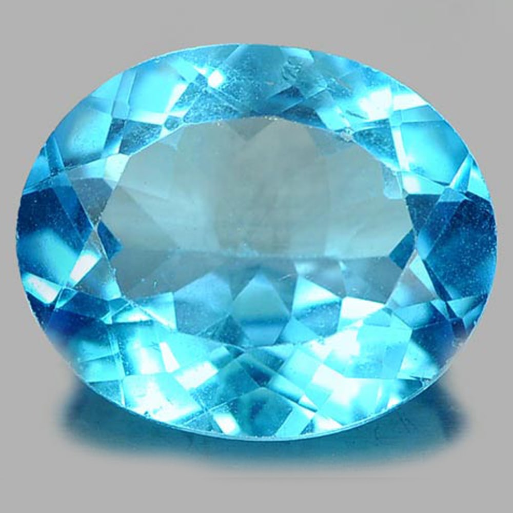 Natural Swiss Blue Topaz 4.81 Ct. Oval Shape 12 x 10 Mm Gemstone From Brazil: Product ID: 807161190 Product Name: Natural Blue Topaz Weight: 4.81 CT. Size: 12 x 10 x 5.4 MM. Shape: Oval Color: Swiss Blue Clarity:VSI Luster: Good Gems Origin: Brazil Treatment: Treated Crystal St