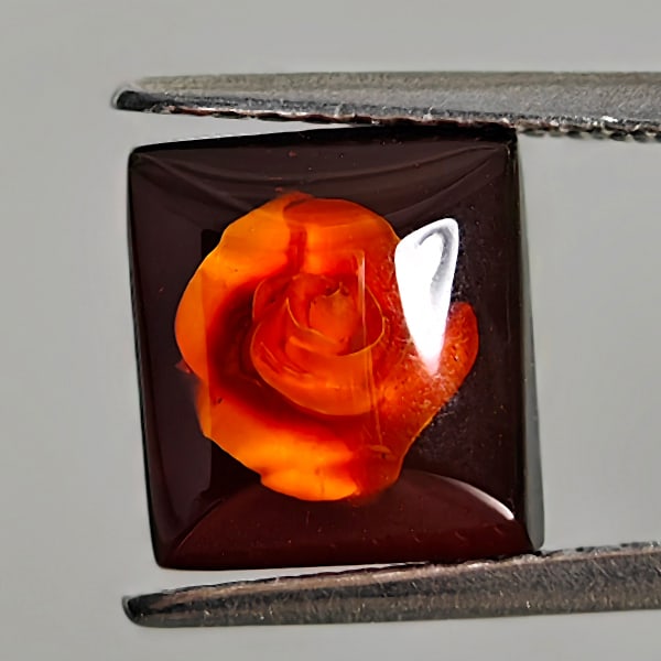 Natural Brown Yellow Amber 0.95 Ct. Flower Carving In Baguette Cabochon Shape 8.6 x 7.8 Mm Gemstone: Product ID: 819090983 Product Name: Natural Amber Weight: 0.95 CT. Size: 8.6 x 7.8 x 4.9 MM. Shape: Baguette Color: Brown Yellow Clarity:Semi - Transparent Luster: Good Gems Origin: Poland Treatment: 