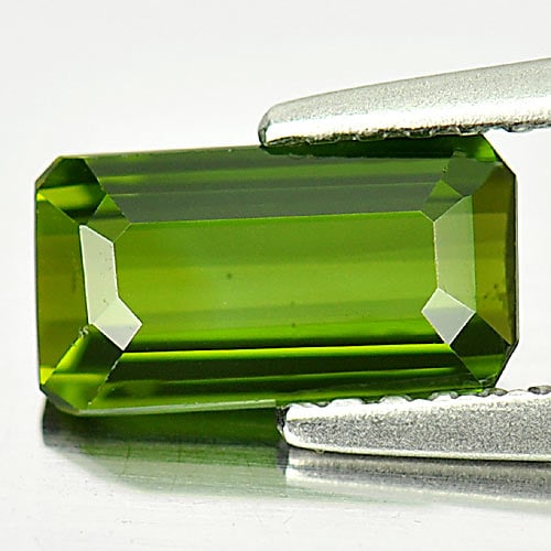 Natural Green Tourmaline 1.03 Ct. VVS Octagon Shape 8.5 x 4.6 Mm Gemstone From Nigeria: Product ID: 807245287 Product Name: Natural Tourmaline Weight: 1.03 CT. Size: 8.5 x 4.6 x 2.8 MM. Shape: Octagon Color: Green Clarity:VVS Luster: Good Gems Origin: Nigeria Treatment: Unheated Crystal 