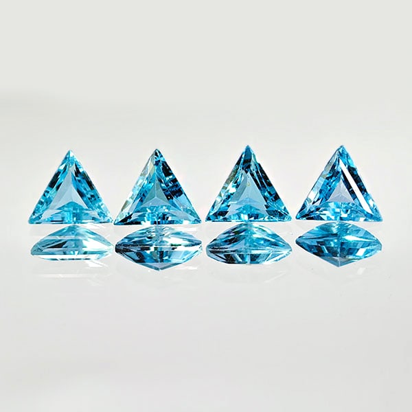 Natural Swiss Blue Topaz 2.15 Ct. 4 Pcs Trilliant Shape 5.5 Mm. Gemstones From Brazil: Product ID: 807167763 Product Name: Natural Blue Topaz Weight: 2.15 CT. Size: 5.5 x 5.5 x 2.9 MM. Shape: Trilliant Color: Blue Clarity:VVS Luster: Good Gems Origin: Brazil Treatment: Treated Crystal S