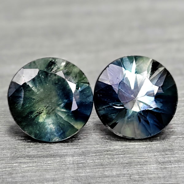 Natural Multi Color Sapphire 0.39 Ct. 2 Pcs Round Diamand Cut 3.4 Mm Gemstones From Tanzania: Product ID: 806162261 Product Name: Natural Green Sapphire Weight: 0.39 CT. Size: 3.4 x 3.4 x 2.5 MM. Shape: Round Diamond Cut Color: Fancy Color Clarity:VSI Luster: Very Good Gems Origin: Tanzania Tr