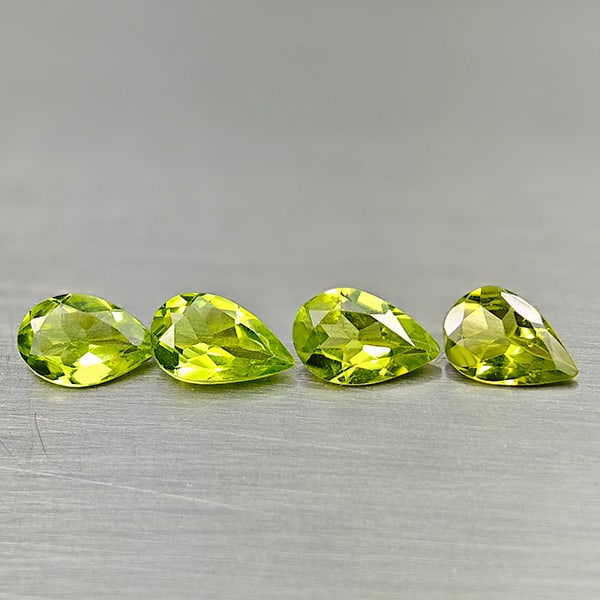 Natural Green Peridot 2.69 Ct. 4 Pcs. Pear Shape 7.8 x 4.8 Mm Gemstones From Pakistan: Product ID: 805317018 Product Name: Natural Peridot Weight: 2.69 CT. Size: 7.8 x 4.8 x 2.8 MM. Shape: Pear Shape Color: Green Clarity:VVS Luster: Good Gems Origin: Pakistan Treatment: Unheated Crystal