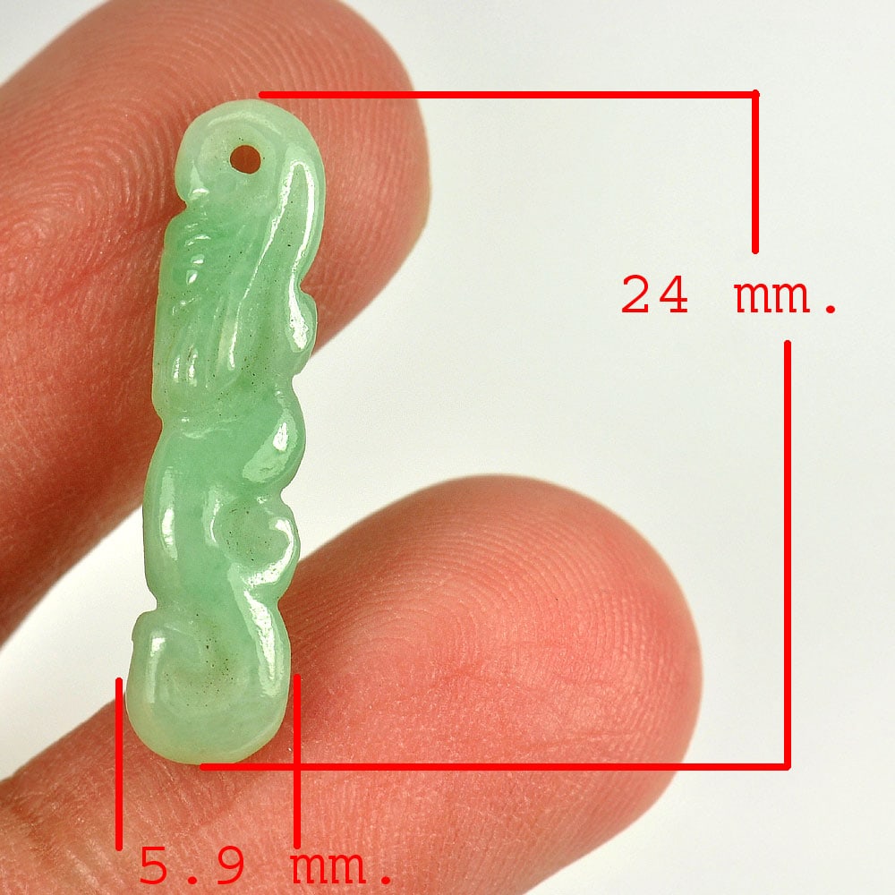 Natural Green Jade 3.89 Ct. Carving Drilled Pendant 24 x 5.9 Mm. Gemstone From Thailand: Product ID: 819814601 Product Name: Natural Jade Weight: 3.89 CT. Size: 24 x 5.9 x 3.1 MM. Shape: Carving Color: Green Clarity:Opaque Luster: Good Gems Origin: Thailand Treatment: Unheated Crystal Str