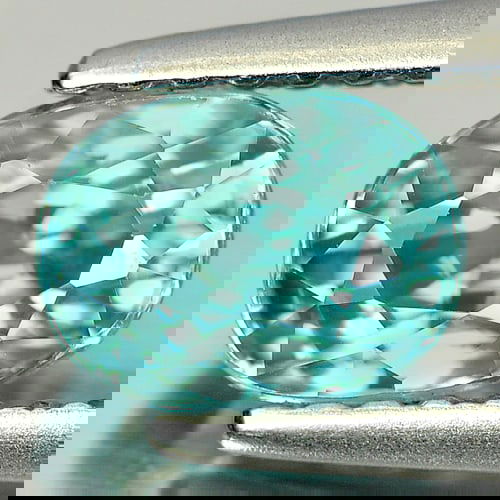 Natural Blue Zircon 1.60 Ct. Oval Shape 6.5 x 5 Mm Gemstone From Cambodia: Product ID: 807727524 Product Name: Natural Zircon Weight: 1.60 CT. Size: 6.5 x 5 x 4.6 MM. Shape: Oval Color: Blue Clarity:VSI Luster: Good Gems Origin: Cambodia Treatment: Heated Crystal Structure: