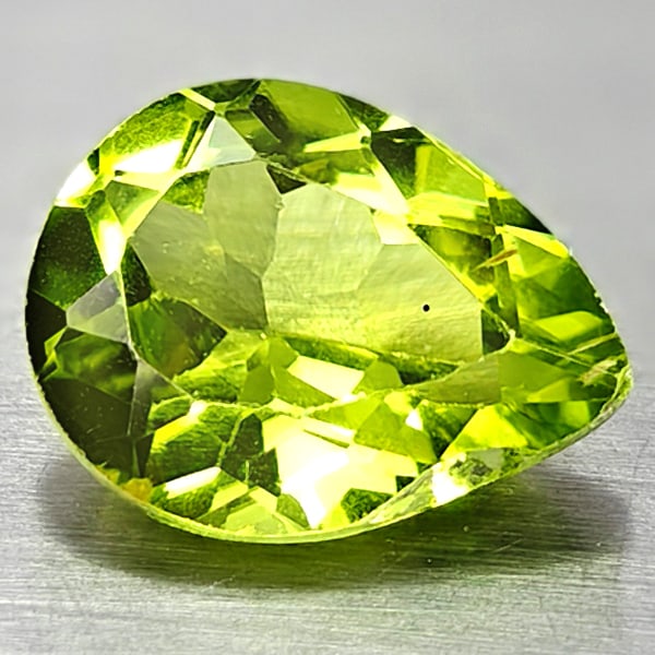 Natural Green Peridot 1.72 Ct. Pear Shape 9 x 7 Mm. Gemstone From Pakistan: Product ID: 805317015 Product Name: Natural Weight: 1.72 CT. Size: 9 x 7 x 4.2 MM. Shape: Pear Color: Green Clarity:VSI Luster: Good Gems Origin: Pakistan Treatment: Unheated Crystal Structure: Hardne
