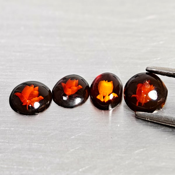 Natural Brown Yellow Amber 0.66 Ct. 4Pcs Flower Carving In Mixed Shape Cabochon Gemstones From: Product ID: 819091044 Product Name: Natural Amber Weight: 0.66 CT. Size: 6.4 x 4.5 x 2.3 to 5.8 x 5.8 x 1.8 MM. Shape: Mixed Shape Cabochon Color: Brown Yellow Clarity:Semi - Transparent Luster: Good 