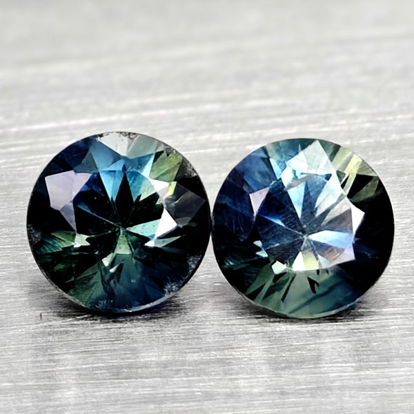 Natural Fancy Color Sapphire 0.38 Ct. 2 Pcs Round Diamand Cut 3.4 Mm Gemstones From Tanzania: Product ID: 806162251 Product Name: Natural Green Sapphire Weight: 0.38 CT. Size: 3.4 x 3.4 x 2.5 MM. Shape: Round Diamond Cut Color: Fancy Color Clarity:VSI Luster: Very Good Gems Origin: Tanzania Tr
