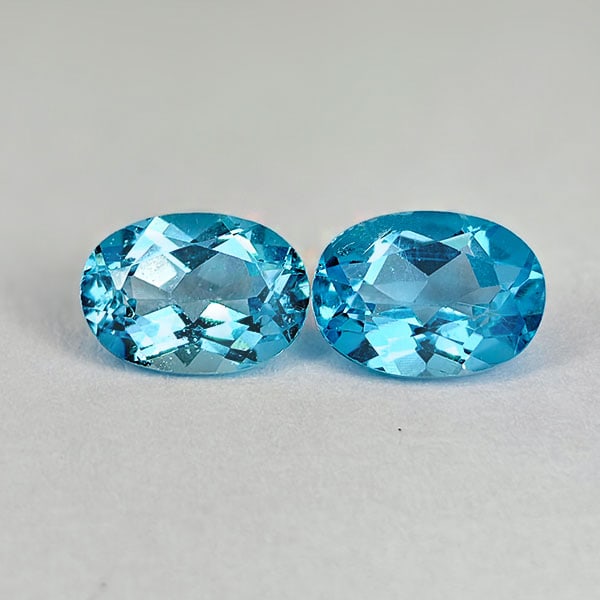 Natural Swiss Blue Topaz 1.97 Ct. 2 Pcs. Oval Shape 7 x 5 Mm. Gemstones From Brazil: Product ID: 807167807 Product Name: Natural Blue Topaz Weight: 1.97 CT. Size: 7 x 5 x 3.5 MM. Shape: Oval Color: Swiss Blue Clarity:VSI Luster: Good Gems Origin: Brazil Treatment: Treated Crystal Stru