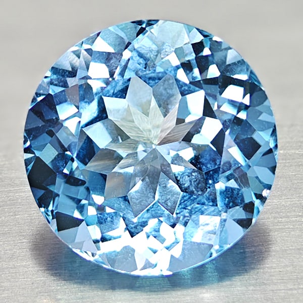 Natural Swiss Blue Topaz 7.89 Ct. Round Shape 12 Mm Gemstone From Brazil: Product ID: 807167852 Product Name: Natural Blue Topaz Weight: 7.89 CT. Size: 12 x 12 x 7.8 MM. Shape: Round Color: Swiss Blue Clarity:IF Luster: Very Good Gems Origin: Brazil Treatment: Treated Cryst