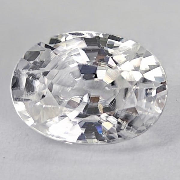 Natural White Zircon 1.41 Ct. Oval Shape 7.1 x 5.2 Mm. Gemstone From Cambodia: Product ID: 807742860 Product Name: Natural Zircon Weight: 1.41 CT. Size: 7.1 x 5.2 x 3.8 MM. Shape: Oval Color: White Clarity:VSI Luster: Good Gems Origin: Cambodia Treatment: Heated Crystal Structur