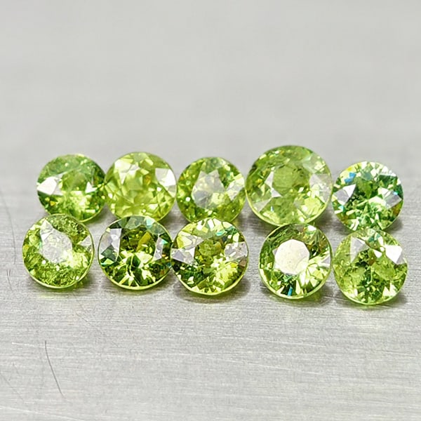Natural Green Demantoid Garnet 1.49 Ct. 10 Pcs. Round Diamond Cut 3.2 Mm Gemstones From Madagascar: Product ID: 802936440 Product Name: Natural Demantoid Weight: 1.49 CT. Size: 3.2 x 3.2 x 2.2 MM. Shape: Round Diamond Cut Color: Green Clarity:VVS Luster: Good Gems Origin: Madagascar Treatment: Unhea