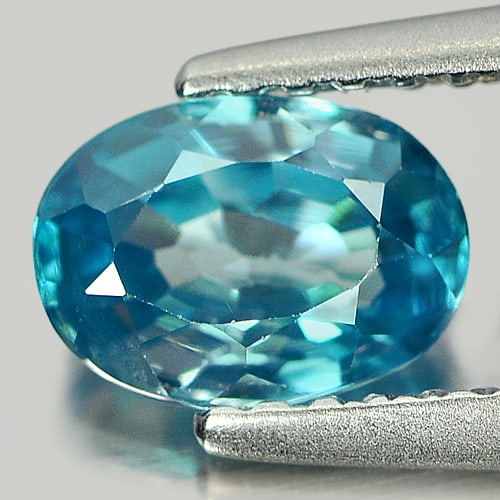 Natural Blue Zircon 1.23 Ct. VVS Oval Shape Size 7 x 5.1 Mm. Gemstone From Cambodia: Product ID: 807721637 Product Name: Natural Zircon Weight: 1.23 CT. Size: 7 x 5.1 x 3.2 MM. Shape: Oval Color: Blue Clarity:VVS Luster: Good Gems Origin: Cambodia Treatment: Heated Crystal Structure: