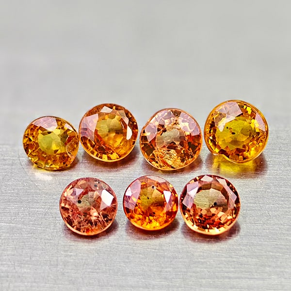 Natural Golden Yellow Songea Sapphire 1.95 Ct. 7 Pcs Round Shape 4 Mm Gemstones From Tanzania: Product ID: 806161975 Product Name: Natural Fancy Color Sapphire Weight: 1.95 CT. Size: 4 x 4 x 2.4 MM. Shape: Round Color: Golden Orange Yellow Clarity:VVS Luster: Good Gems Origin: Tanzania Treatmen