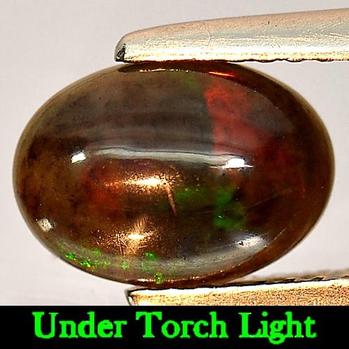 Natural Fire Red Black Opal 0.77 Ct. Oval Cabochon Shape 9.3 x 6.6 Mm. Gemstone Unheated: Product ID: 818724263 / Product Name: Natural Opal / Weight: 0.77 CT. / Size: 9.3 x 6.6 x 3.6 MM. / Shape: Oval Cabochon / Color: Rainbow Fire Red Black / Clarity:Semi - Transparent / Luster: Iridesce