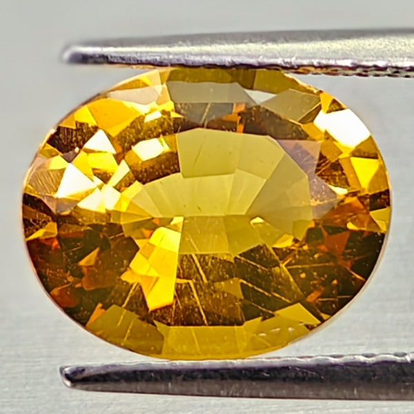 Natural Yellow Gold Citrine 2.23 Ct. Clean Oval Shape 10.1 x 8.1 Mm Gemstone From Brazil: Product ID: 801815007 Product Name: Natural Citrine Weight: 2.23 CT. Size: 10.1 x 8.1 x 5.2 MM. Shape: Oval Color: Yellow Gold Clarity:VSI Luster: Good Gems Origin: Brazil Treatment: Unheated Crystal 