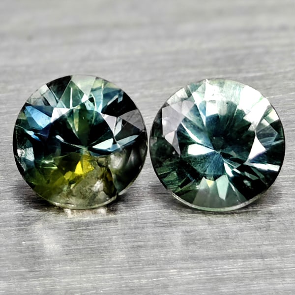 Natural Multi Color Sapphire 0.42 Ct. 2 Pcs Round Diamand Cut 3.5 Mm Gemstones From Tanzania: Product ID: 806162256 Product Name: Natural Green Sapphire Weight: 0.42 CT. Size: 3.5 x 3.5 x 2.6 MM. Shape: Round Diamond Cut Color: Fancy Color Clarity:VSI Luster: Very Good Gems Origin: Tanzania Tr