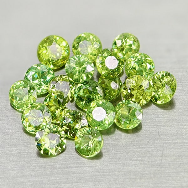 Natural Green Demantoid Garnet 2.87 Ct. 20 Pcs. Round Diamond Cut 3.5 Mm Gemstones From Madagascar: Product ID: 802936433 Product Name: Natural Demantoid Weight: 2.87 CT. Size: 3.5 x 3.5 x 2.5 MM. Shape: Round Diamond Cut Color: Green Clarity:VVS Luster: Good Gems Origin: Madagascar Treatment: Unhea