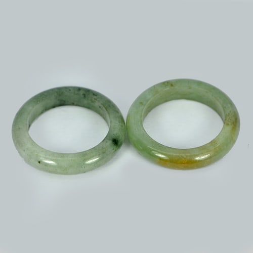 Natural Green Rings Jade Size 5 Round Shape 21.86 Ct. 2 Pcs. Gemstone From Thailand: Product ID: 819809825 Product Name: Natural Jade Weight: 21.86 CT. Size: 22 x 22 MM. Shape: Round Color: White Green Honey Clarity:Opaque Luster: Good Gems Origin: Thailand Treatment: Unheated Crystal