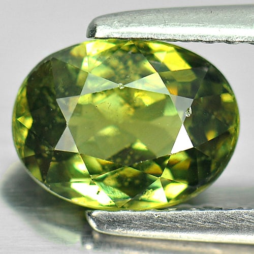 Certified Natural Green Demantoid Garnet 1.70 Ct. Oval Shape 8.08 x 6.19 Mm. Gemstone From: Product ID: 802917081 Product Name: Natural Demantoid Weight: 1.70 CT. Size: 8.08 x 6.19 x 3.81 MM. Shape: Oval Color: Green Clarity:SI1 Luster: Very Good Gems Origin: Madagascar Treatment: Unheated C