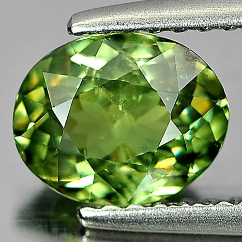Natural Green Demantoid Garnet 1.25 Ct. Oval Shape 7.3 x 5.9 Mm. Gemstone Unheated From Madagascar: Product ID: 802922026 Product Name: Natural Demantoid Weight: 1.25 CT. Size: 7.3 x 5.9 x 3.5 MM. Shape: Oval Color: Green Clarity:SI1 Luster: Very Good Gems Origin: Mardagascar Treatment: Unheated Cry