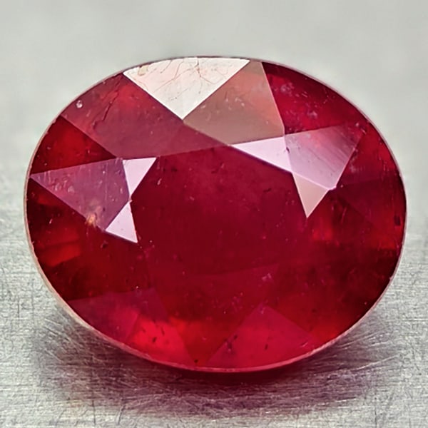 Natural Red Ruby 2.32 Ct. Oval Shape 8 x 6.6 Mm Gemstone From Madagascar: Product ID: 805935165 Product Name: Natural Ruby Weight: 2.32 CT. Size: 8 x 6.6 x 4.7 MM. Shape: Oval Color: Red Clarity:SI Luster: Good Gems Origin: Madagascar Treatment: Heated (Lead-glass filling)