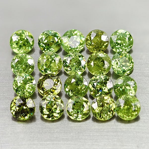 Natural Green Demantoid Garnet 4.23 Ct. 20 Pcs. Round Diamond Cut 3.6 Mm Gemstones From Madagascar: Product ID: 802936437 Product Name: Natural Demantoid Weight: 4.23 CT. Size: 3.6 x 3.6 x 2.7 MM. Shape: Round Diamond Cut Color: Green Clarity:VVS Luster: Good Gems Origin: Madagascar Treatment: Unhea