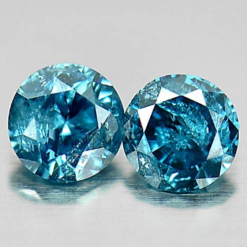 Natural Blue Loose Diamond 0.16 Ct. 2 Pcs. Round Brilliant Cut 2.7 Mm.: Product ID: 802103213 Product Name: Natural Enhanced Diamond Weight: 0.16 CT. Size: 2.7 x 2.7 x 1.6 MM. Shape: Round Brilliant Cut Color: Blue Clarity:VSI - SI1 Luster: Scintillating Gems Origin: Belg