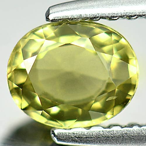 Natural Greenish Yellow Tourmaline 0.58 Ct. Oval Shape 5.9 x 4.8 Mm. Gemstone From Nigeria: Product ID: 807249369 Product Name: Natural Tourmaline Weight: 0.58 CT. Size: 5.9 x 4.8 x 2.9 MM. Shape: Oval Color: Greenish Yellow Clarity:VSI Luster: Good Gems Origin: Nigeria Treatment: Unheated C