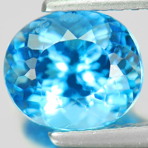 Natural Swiss Blue Topaz 2.08 Ct. VVS Oval Shape 7.7 x 6.8 Mm. Gemstone From Brazil: Product ID: 807155372 Product Name: Natural Blue Topaz Weight: 2.08 CT. Size: 7.7 x 6.8 x 5.5 MM. Shape: Oval Color: Swiss Blue Clarity:VVS Luster: Good Gems Origin: Brazil Treatment: Treated Crystal 
