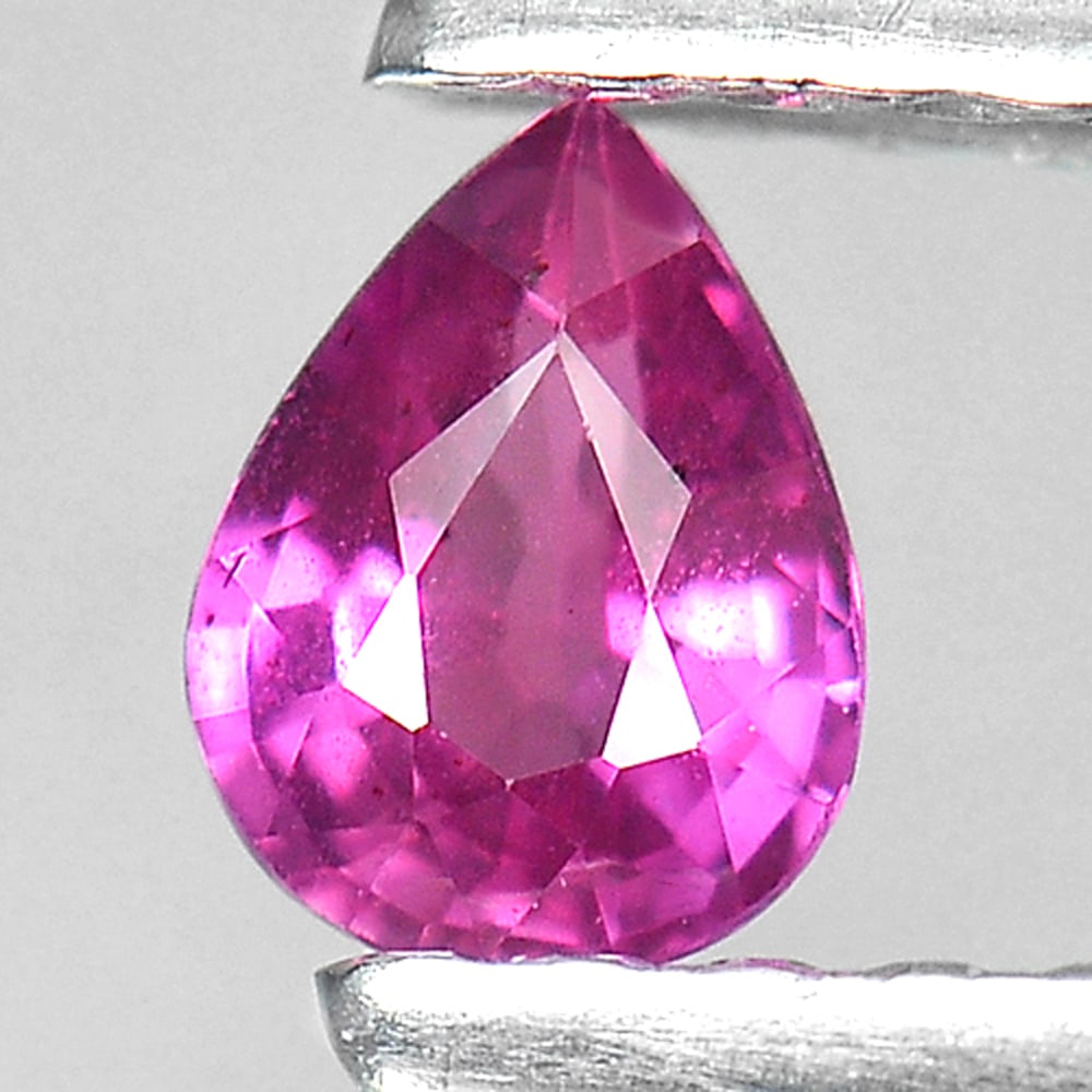 Natural Pink Sapphire 0.25 Ct. Pear Shape 4.4 x 3.4 xMm. Natural Gemstone Tanzania: Product ID: 806140708 Product Name: Natural Pink Sapphire Weight: 0.25 CT. Size: 4.4 x 3.4 x 2.2 MM. Shape: Pear Color: Pink Clarity:VSI Luster: Good Gems Origin: Tanzania Treatment: Heated Crystal St