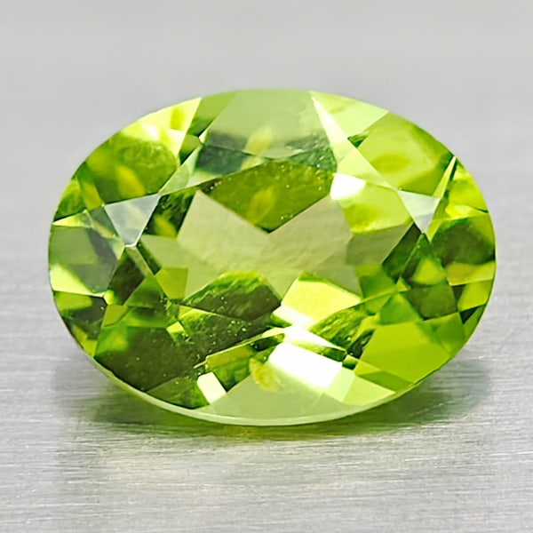 Natural Green Peridot 1.51 Ct. Oval Shape 8 x 6 Mm. Gemstone From Pakistan: Product ID: 805316988 Product Name: Natural Peridot Weight: 1.51 CT. Size: 8 x 6 x 4.3 MM. Shape: Oval Color: Green Clarity:VSI Luster: Good Gems Origin: Pakistan Treatment: Unheated Crystal Structure