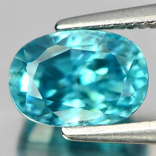 Natural Blue Zircon 2.11 Ct. Oval Shape 7.6 x 5.3 Mm Gemstone From Cambodia: Product ID: 807730304 Product Name: Natural Zircon Weight: 2.11 CT. Size: 7.6 x 5.3 x 4.6 MM. Shape: Oval Color: Blue Clarity:SI1 Luster: Good Gems Origin: Cambodia Treatment: Heated Crystal Structure
