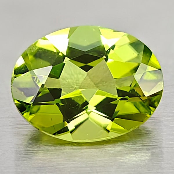 Natural Green Peridot 1.13 Ct. Oval Shape Size 8 x 6 Mm. Unheated Gemstone From Pakistan: Product ID: 805316964 Product Name: Natural Peridot Weight: 1.13 CT. Size: 8 x 6 x 3.5 MM. Shape: Oval Color: Green Clarity:VSI Luster: Good Gems Origin: Pakistan Treatment: Unheated Crystal Structure