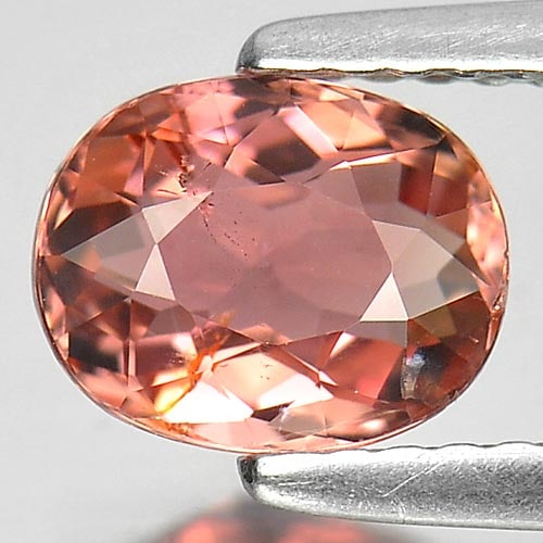 Natural Peach Pink Tourmaline 1.23 Ct. Oval Shape 7.4 x 5.9 Mm. Gemstone From Nigeria: Product ID: 807234347 Product Name: Natural Tourmaline Weight: 1.23 CT. Size: 7.4 x 5.9 x 3.9 MM. Shape: Oval Color: Peach Pink Clarity:SI Luster: Good Gems Origin: Nigeria Treatment: Unheated Crystal