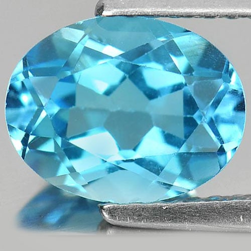 Natural Swiss Blue Topaz 2.23 Ct. VVS Oval Shape 9 x 7 Mm. Gemstone From Brazil: Product ID: 807163086 Product Name: Natural Blue Topaz Weight: 2.23 CT. Size: 9 x 7 x 4.7 MM. Shape: Oval Color: Swiss Blue Clarity:VVS Luster: Good Gems Origin: Brazil Treatment: Treated Crystal Stru