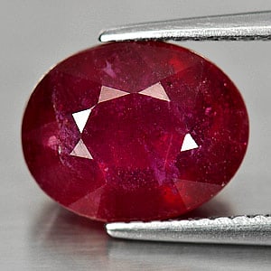 Natural Purplish Red Ruby 4.22 Ct. Oval Shape 10.3 x 8.2 Mm. Gemstone From Madagascar: Product ID: 805931119 Product Name: Natural Ruby Weight: 4.22 CT. Size: 10.3 x 8.2 x 5 MM. Shape: Oval Color: Red Clarity:SI1 Luster: Good Gems Origin: Madagascar Treatment: Heated Lead-glass filling