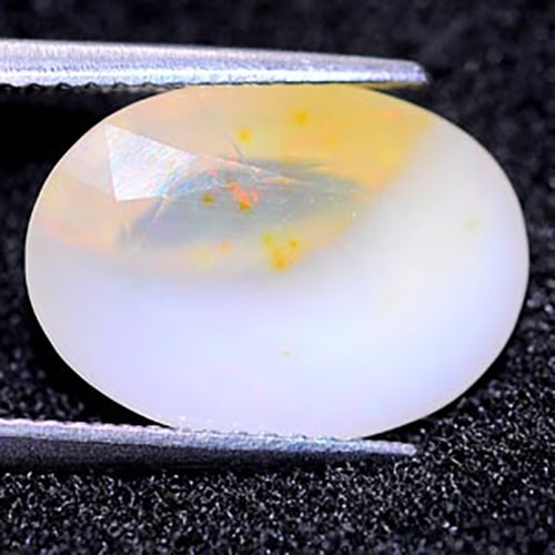 Multi Color Opal 5.57 Ct. Oval Shape 15 x 11 Mm. Natural Unheated Gemstone From Ethiopia: Product ID: 818711833 Product Name: Natural Opal Weight: 5.57 CT. Size: 15 x 11 x 8 MM. Shape: Oval Color: Multi Color Clarity:Semi - Transparent Luster: Good Gems Origin: Ethiopia Treatment: Unheated