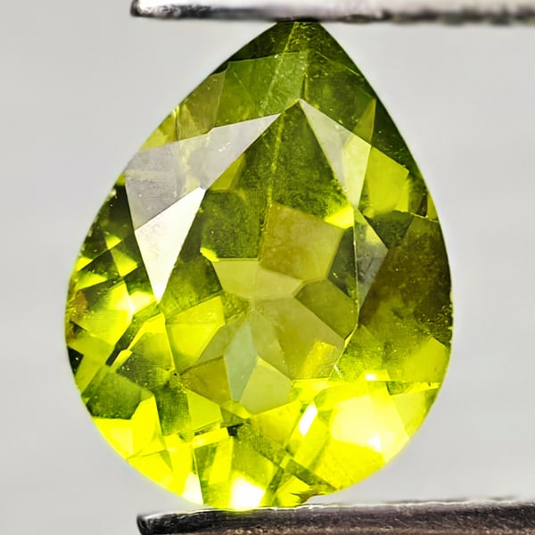 Natural Green Peridot 1.47 Ct. Pear Shape 8.9 x 6.9 Mm Gemstone From Pakistan: Product ID: 805317090 Product Name: Natural Green Sapphire Weight: 1.47 CT. Size: 8.9 x 6.9 x 4.4 MM. Shape: Pear Shape Color: Green Clarity:VSI Luster: Good Gems Origin: Pakistan Treatment: Unheated 