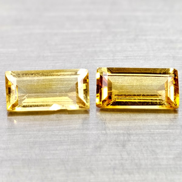 Natural Yellow Citrine 2.66 Ct. 2 Pcs Clean Baguette Shape 10.1 x 5 Mm Gemstones From Brazil: Product ID: 801815078 Product Name: Natural Citrine Weight: 2.66 CT. Size: 10.1 x 5 x 3.3 MM. Shape: Baguette Color: Yellow Clarity:VSI Luster: Good Gems Origin: Brazil Treatment: Unheated Crystal Str