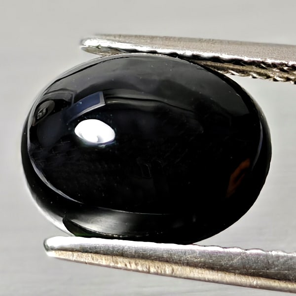 Natural Black Spinel 3.15 Ct. Oval Cabochon Shape 10.2 x 8.2 Mm Gemstone From Thailand: Product ID: 806609903 Product Name: Natural Spinel Weight: 3.15 CT. Size: 10.2 x 8.2 x 4.2 MM. Shape: Oval Cabochon Color: black Clarity:Opaque Luster: Good Gems Origin: Thailand Treatment: Unheated C