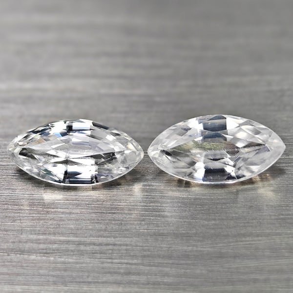 Natural White Zircon 1.71 Ct. 2 Pcs. Marquise Shape 8.1 x 4.1 Mm Gemstones From Cambodia: Product ID: 807742947 Product Name: Natural Zircon Weight: 1.71 CT. Size: 8.1 x 4.1 x 2.6 MM. Shape: Marquise Color: White Clarity:VSI Luster: Good Gems Origin: Cambodia Treatment: Heated Crystal Stru